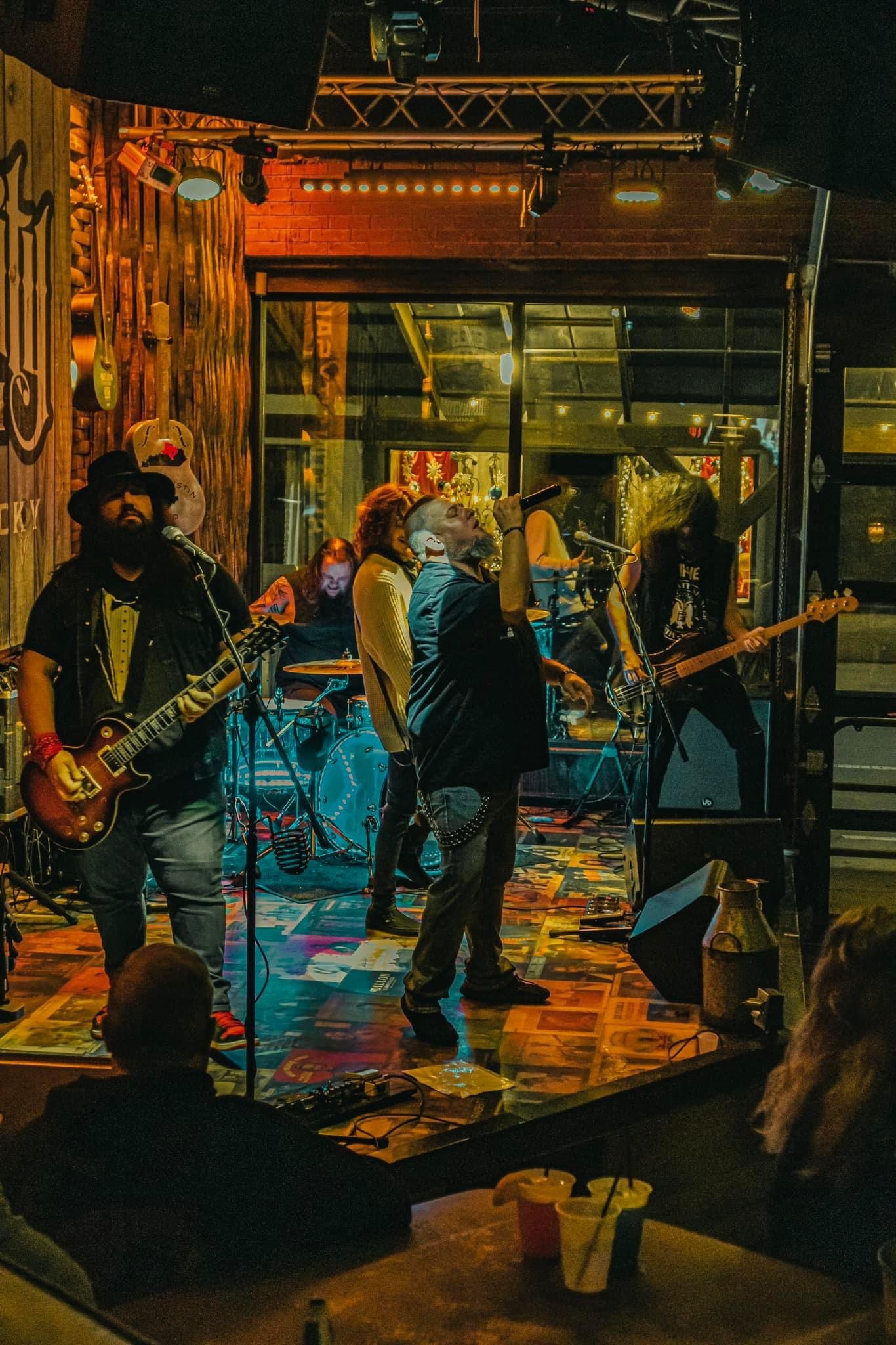 Taylor Davis on stage with his guitar